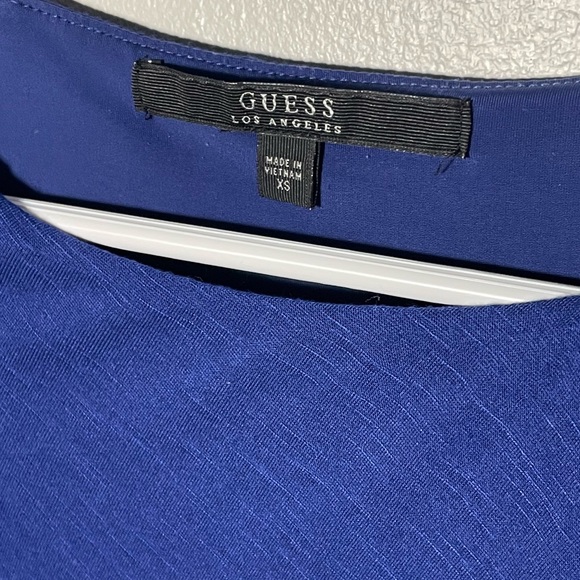 Used guess blue dress with one side longer than other detail on the bottom - Picture 3 of 4